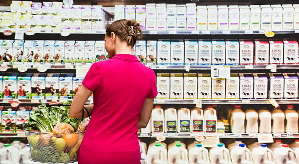 istock Rear view of customer in supermarket 530925828