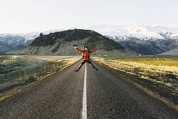 istock Man jumping on the road 530925834