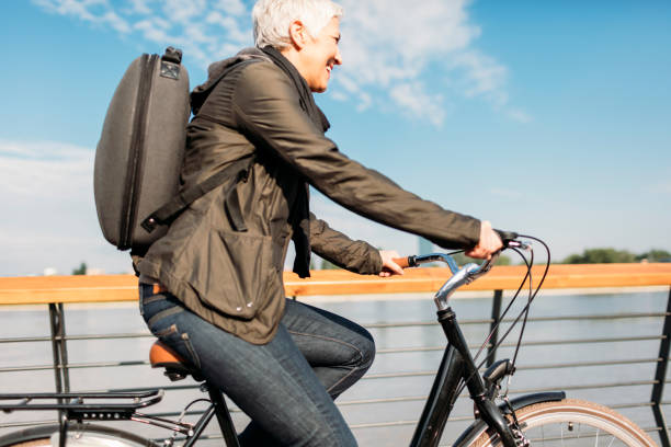 istock Mature Woman Riding Bicycle. 530926394