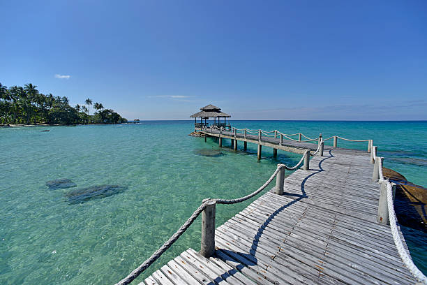 istock Wooden bridge at sunny day 530927803
