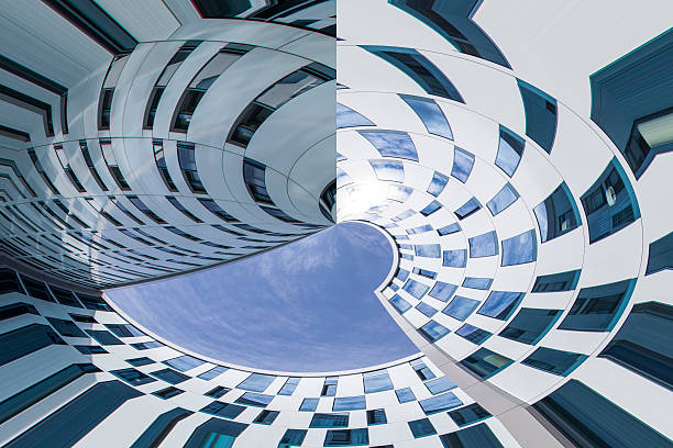 istock Abstract facade lines and glass reflection on modern building. 530927855