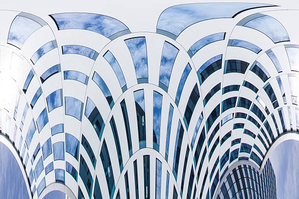 istock Abstract facade lines and glass reflection on modern building. 530927861