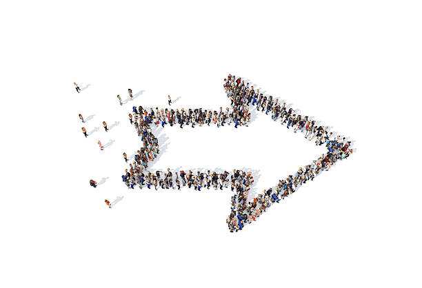 istock Group of people forming a directional arrow sign 530931132