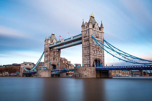 london tower bridge across the river thames - tower bridge stok fotoğraflar ve resimler