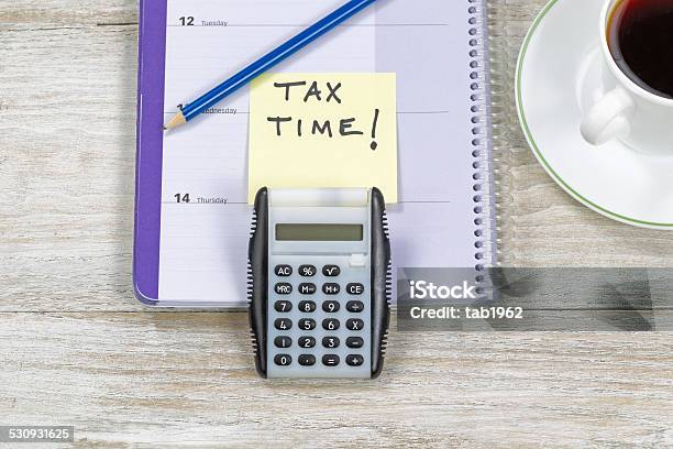 Doing Income Taxes Stock Photo - Download Image Now - Above, April, Bright