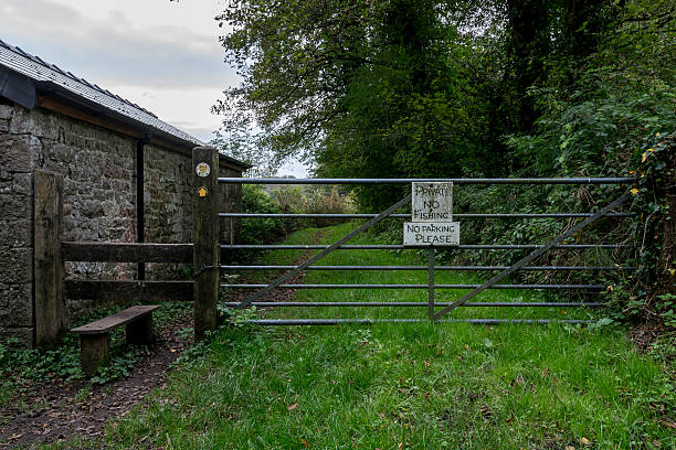istock metal gate and a style on a public footpath 530931726