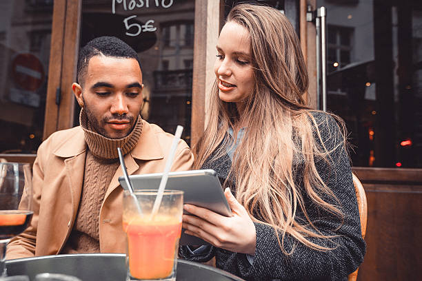 istock Young Couple at a Cafe in Paris 530932858
