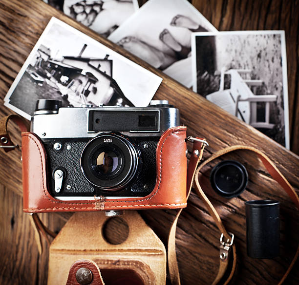 istock Old rangefinder camera and black-and-white photos. 530934251