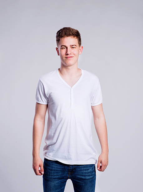 istock Boy in jeans and t-shirt, young man, studio shot 530934732