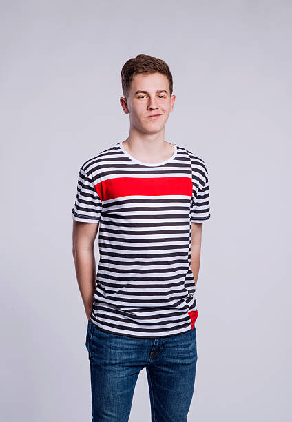 istock Boy in jeans and t-shirt, young man, studio shot 530935202