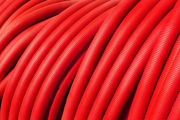 istock Tubing. Red plumbing pipe close-up. 530935732
