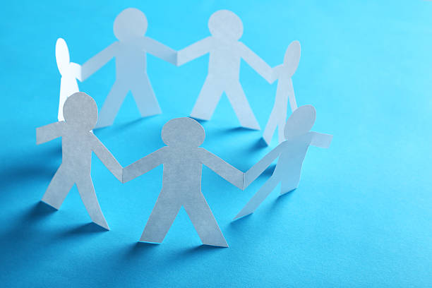istock Paper people on the blue paper background 530936868