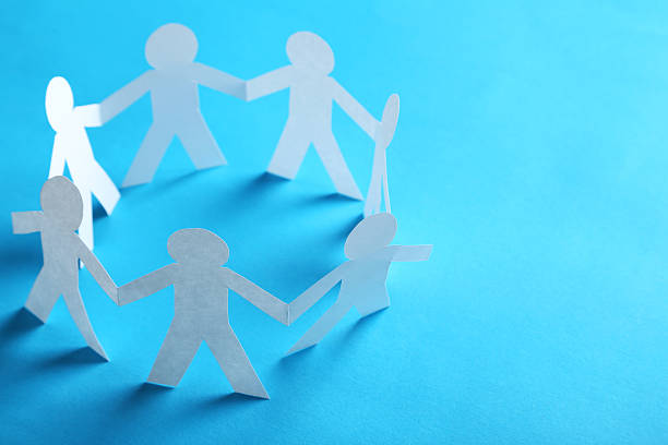 istock Paper people on the blue paper background 530936908