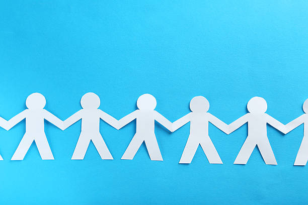 istock Paper people on the blue paper background 530936988