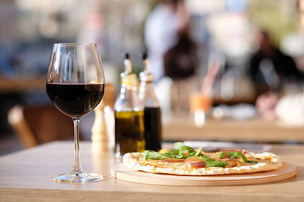 istock Pizza and red wine in restaurant 530938664