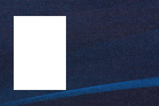 istock Blank folded paper poster hanging on paper taxture wall. 530938716