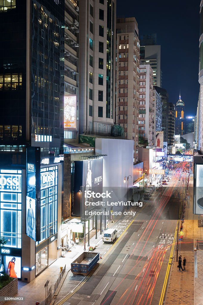 Hong Kong Hong Kong, Сhina - December 17, 2014 : Canton Road in Tsim Sha Tsui district in Hong kong. Canton Road is home to many upscale retail shops, shopping centres with busy traffic. 2015 Stock Photo