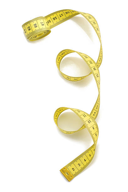 istock measuring tape on white background 530941082
