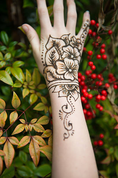 istock Wet henna tatoo on hand and arm 530942385