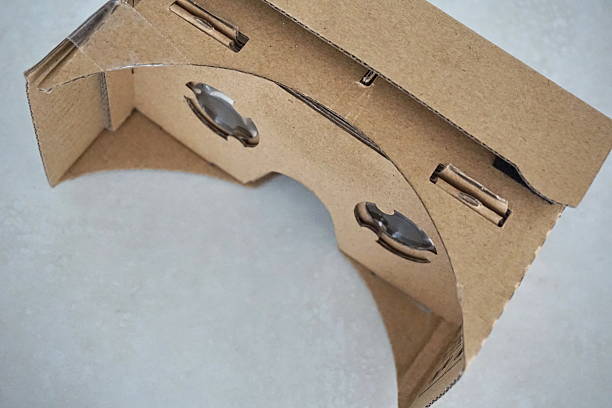 istock Cardboard headset for virtual reality with glass lenses 530943032