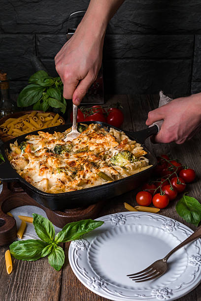 istock Baked pasta with broccoli, cauliflower, cheese and bechamel sauc 530943178