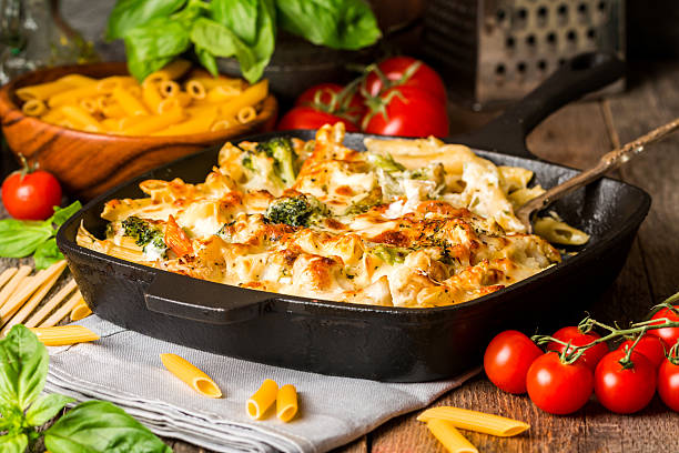 Baked pasta with broccoli, cauliflower, cheese and bechamel sauc