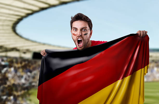 istock Fan holding the flag of Germany 530944788