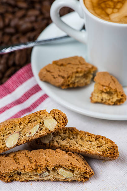 istock almond biscuits with cup of coffee 530946153