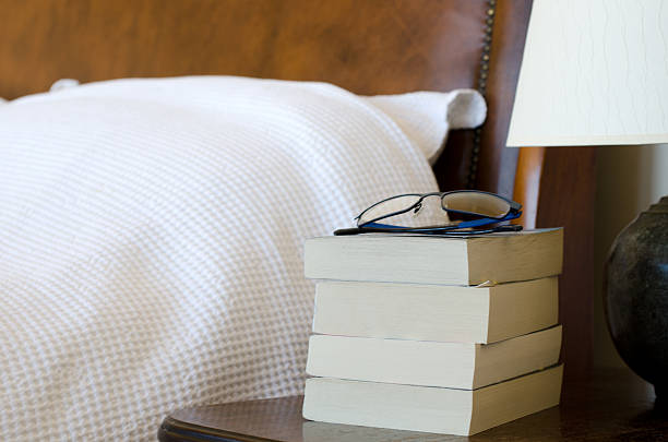 stack of old books in home interior 