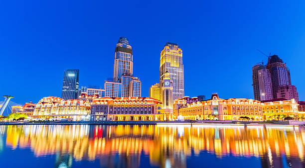 istock tianjin jinwan plaza at night 530947026