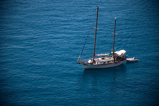 istock Sailing Boat in the blue sea 530947167