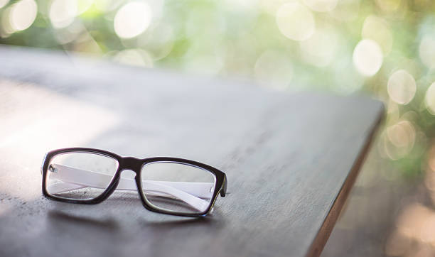 istock Glasses on wooden water soft focus 530947664