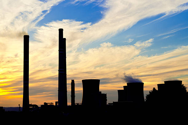 istock silhouette of power plant at dusk 530947730