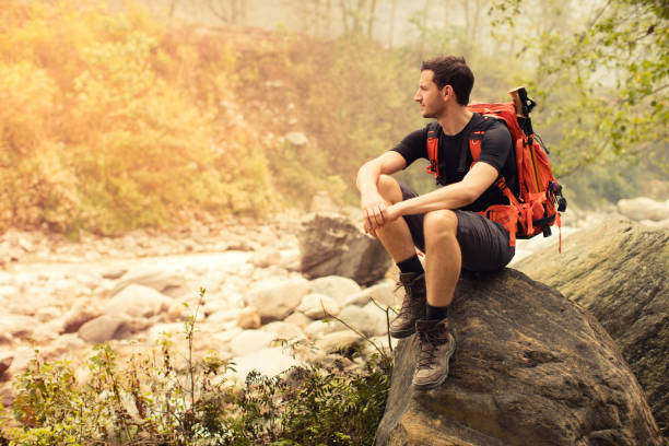 istock Young man hiking on mountains 530948532