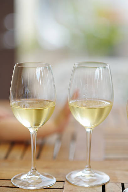 istock Two glass of white wine 530949495