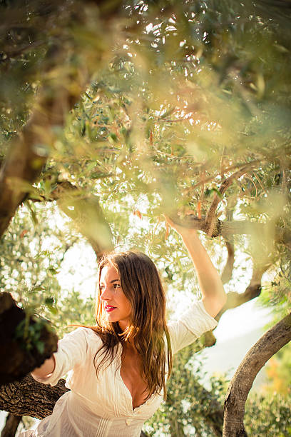 istock Attractive, young brunette on the beach 530951357