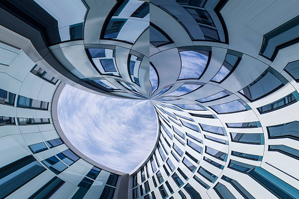 istock Abstract facade lines and glass reflection on modern building. 530951373