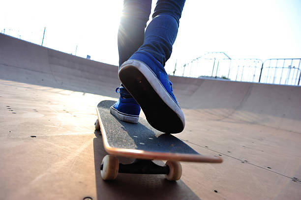 istock skateboarder at skatepark 530952305