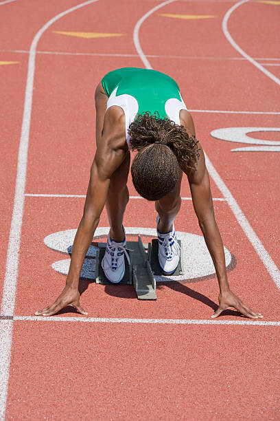 istock Female athlete in starting block 530961499