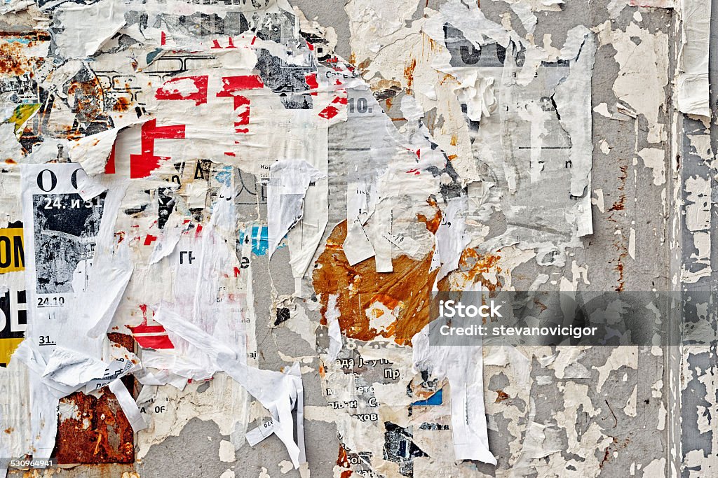 Torn Poster Wall Texture Torn Poster Wall Texture Pattern as Urban Background Wall - Building Feature Stock Photo