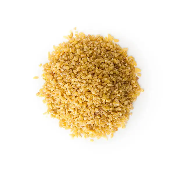 Bulgur Wheat  with copy space , isolated on white