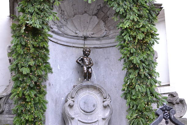 Manneken Pis Statue, Brussells Famous statue in Brussels manneken pis statue in brussels belgium stock pictures, royalty-free photos & images