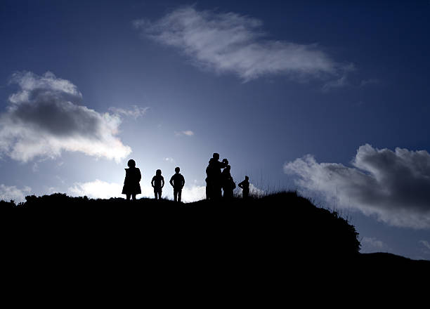 istock man's silhouette on the colorful sky during sunset. 530970065