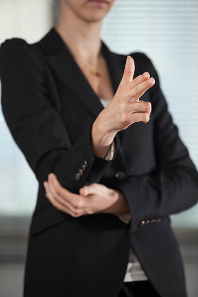 istock Business woman pointing fingers 530970093