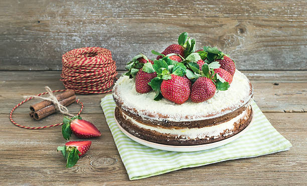 istock Rustic spicy ginger cake with cream-cheese filling and fresh str 530970389
