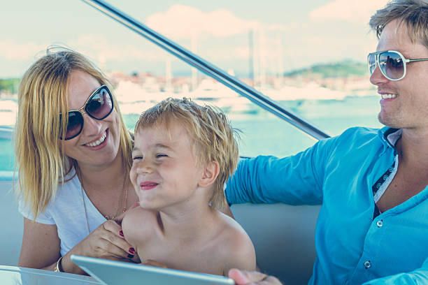 istock Family having fun on a yacht 530971029