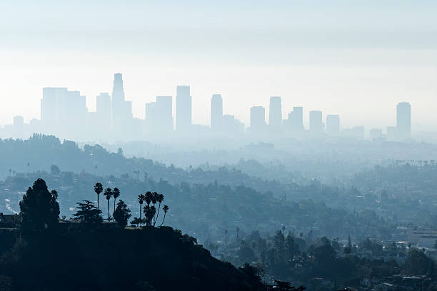 LA Smoggy Fog Downtown Los Angeles with misty morning smoggy fog. city of los angeles stock pictures, royalty-free photos & images