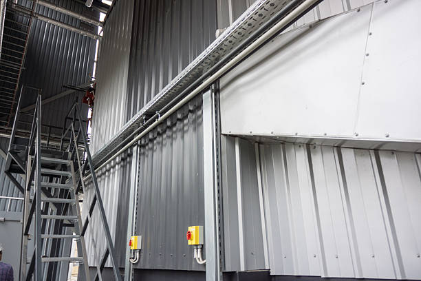 istock industrial site with steel storage units 530971243