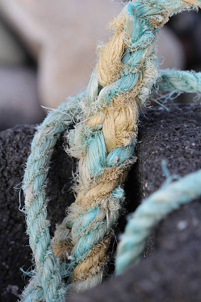 istock Sea Stone with blue rope 530971933