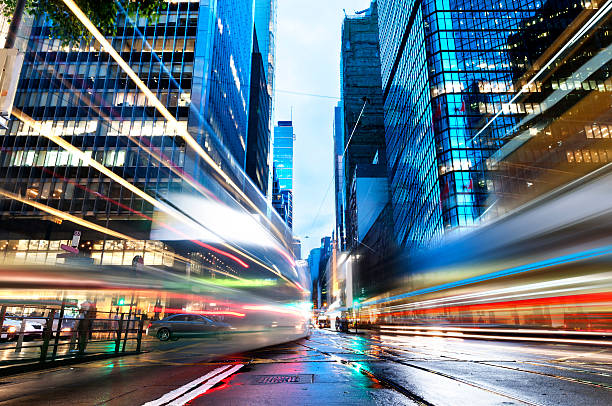 istock light trails on the modern building in Hong Kong China 530972397